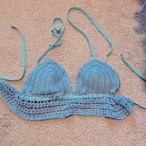 Blue/green bathing suit top.